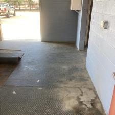 Pressure-washing-horse-stalls-using-hot-water-and-high-pressure-removing-rubber-mats-from-concrete-horse-pens 0